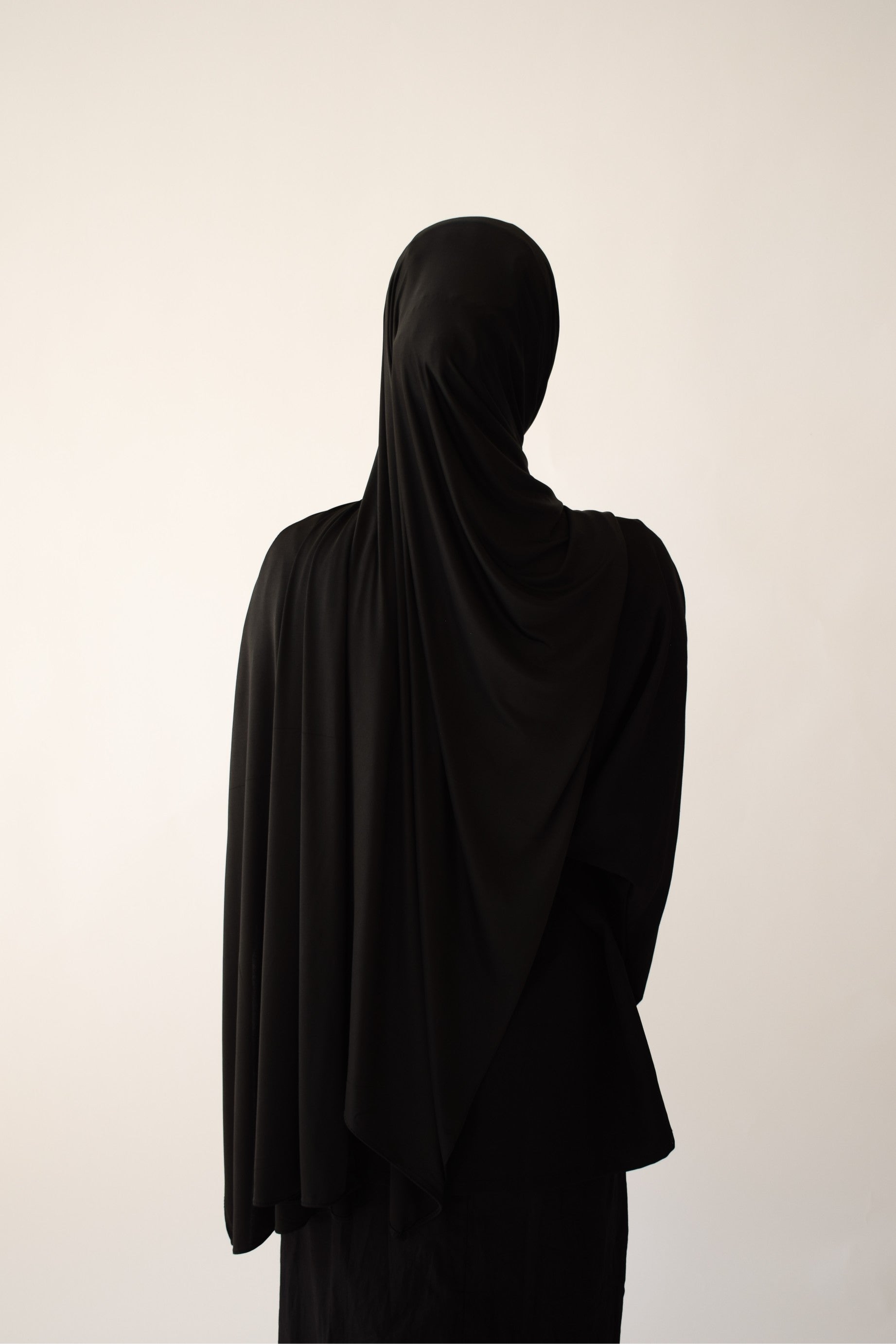 Black liquid jersey hijab by Chowdhury Dress