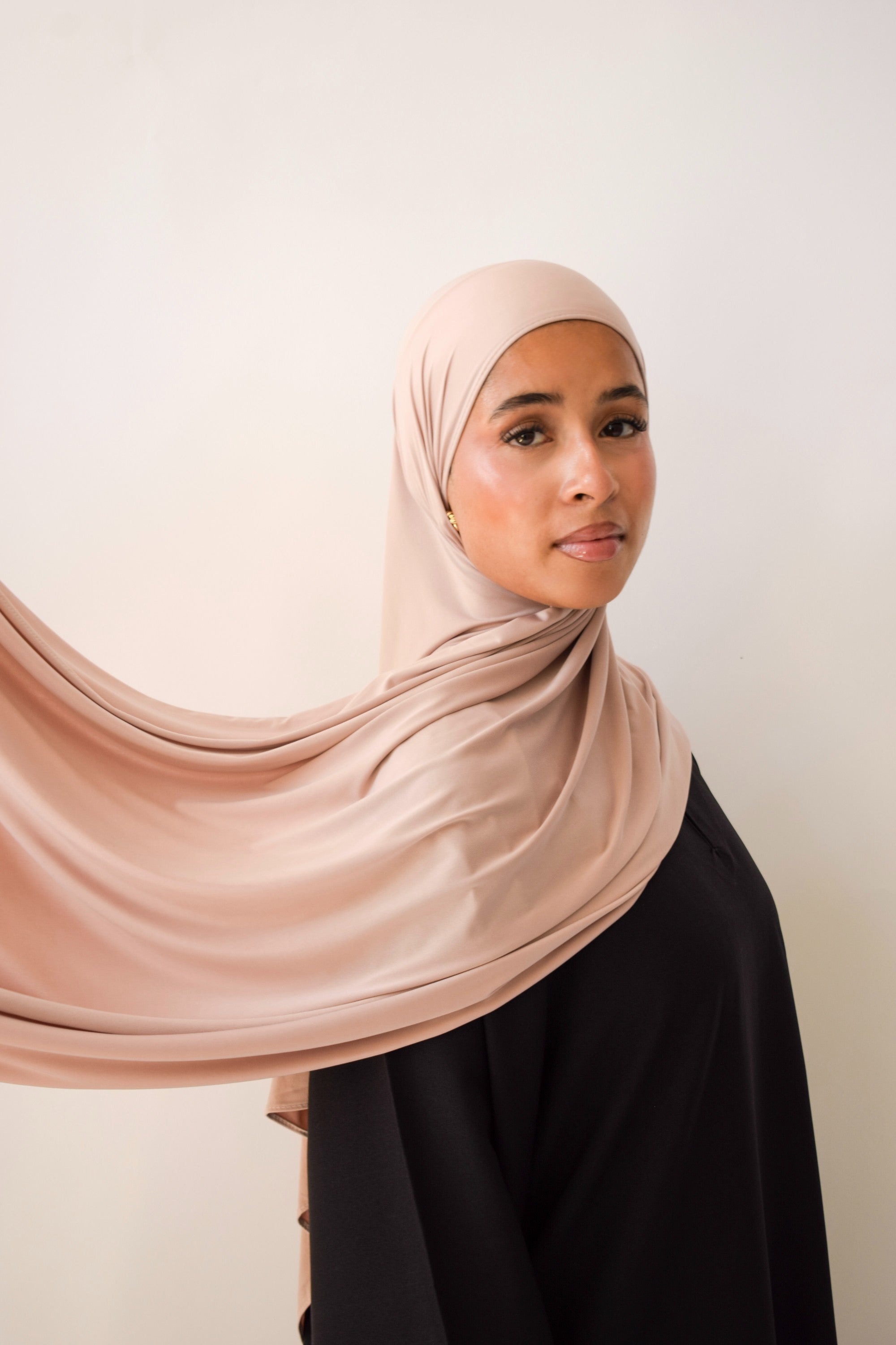 Rosewater liquid jersey hijab draped and styled