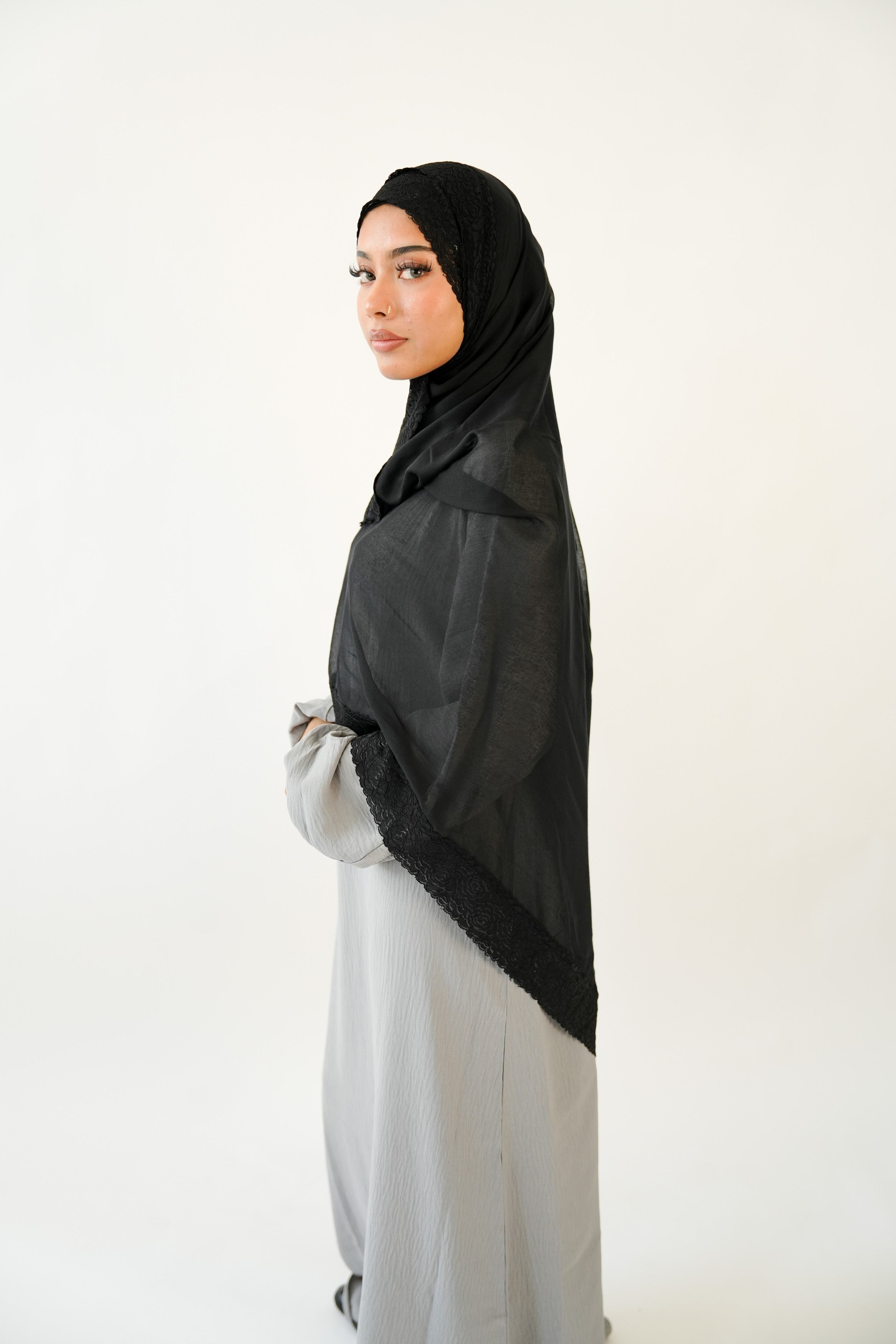 Black lace modal hijab draped and styled