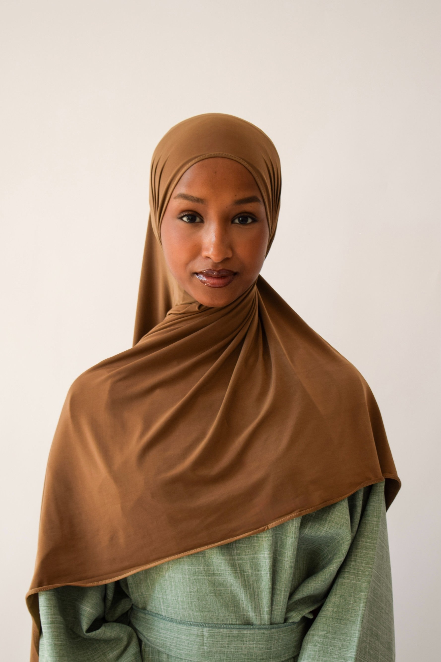 Caramel liquid jersey hijab draped and styled